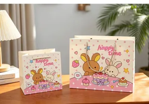 Süße Kaninchen Geschenktüten mit rosa Punkten, ideal für Geburtstagsgeschenke und Präsente.