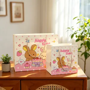 Niedliche Cartoon Kaninchen Geschenktueten Set mit rosa Punkten fuer Geburtstagsfeier.