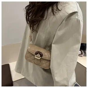 Chic quilted crossbody bag for women, elegant shoulder bag with unique wooden buckle design.