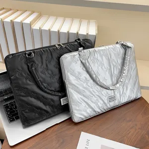 Quilted puffer laptop bag with cute bow embossed pattern, large capacity portable tote.