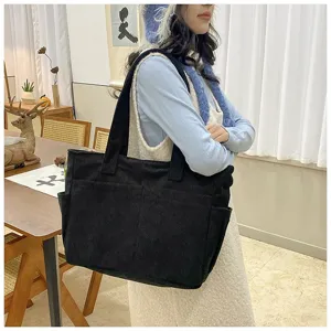 Black corduroy shoulder bag for women, large capacity casual daily tote with pockets.