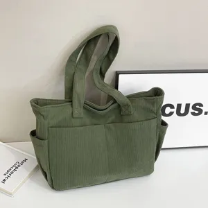 Dark green corduroy tote bag for women, large capacity casual shoulder bag for commuting.