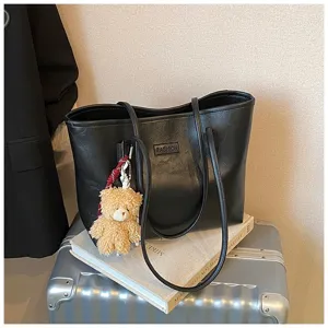 Classic black oil wax leather tote bag for women, large capacity stylish casual shoulder bag.