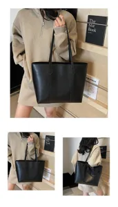 Λεπτομέρεια μαύρης τσάντας shopper από PU δέρμα με λουράκι ώμου και ευρύχωρο εσωτερικό σχεδιασμό.