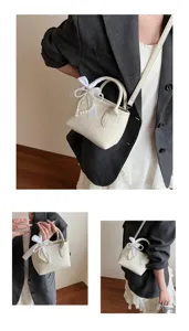 Elegante borsa a mano mini in tinta unita con fiocco di perle, borsa a tracolla chic da donna.