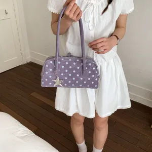 Chic purple polka dot shoulder pillow bag for women, cute daily handbag with star charm.