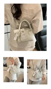 Elegante borsa a secchiello monocolore da donna con nastro di perle per lavoro e tempo libero.
