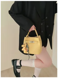 Schicke gelbe Litschimuster Eimer Handtasche mit Metallschloss, retro Umhängetasche für Damen.