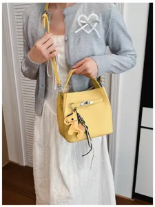Gelbe Litschi-Muster Leder Eimer Tasche Damen Retro Handtasche stylische Umhängetasche