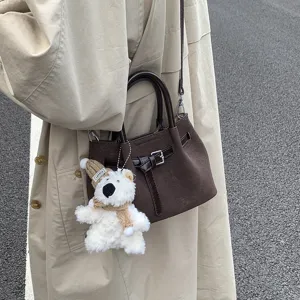 Stylish dark brown woven texture shoulder bucket bag for women with cute bear pendant