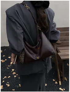 Retro solid color shoulder bag women 2025 autumn new minimalist luxury crossbody bag.
