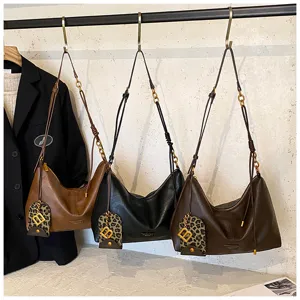 Classic vintage PU leather hobo shoulder bag for women, versatile minimalist crossbody purse.