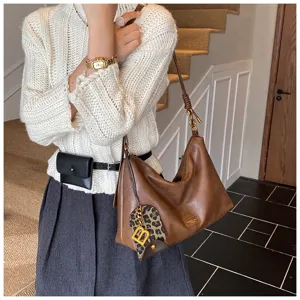 Korean vintage brown shoulder bag for women, stylish hobo crossbody purse with leopard charm.