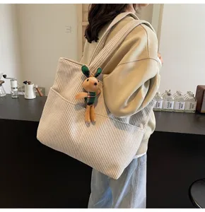 Beige corduroy tote bag for women, stylish large capacity casual shoulder bag with cute bunny.