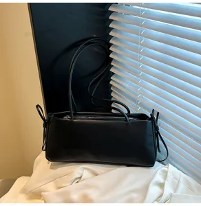 Black minimalist shoulder bag for women, chic casual underarm bag with thin double straps.