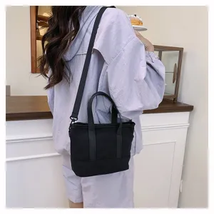 Black canvas crossbody bag casual shoulder tote purse for women daily fashion travel.