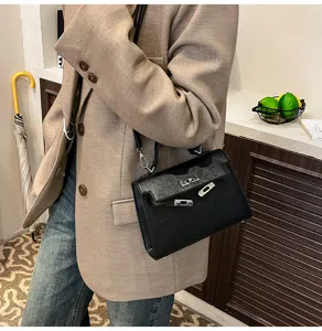 Bolso bandolera negro retro para mujer, diseño Kelly clásico, bolso cruzado versátil y elegante.