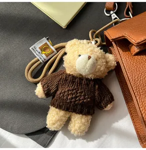 Bolso de mano retro de cuero PU con lindo colgante de oso de peluche elegante bolso
