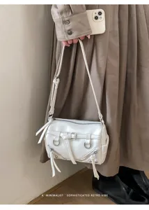 White PU leather cylindrical shoulder crossbody bag with zipper and tassel details for women