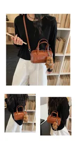 Retro oil-wax leather pillow bag for women, stylish vintage shoulder and crossbody handbag.