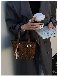 Korean vintage leopard print bucket bag for women, PU suede patchwork handbag with chic charm.