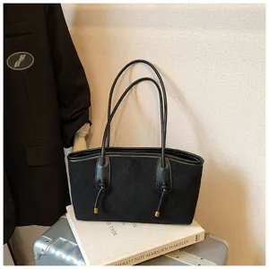 Borsa tote in camoscio nero da donna, elegante borsa a spalla trapuntata per uso quotidiano.