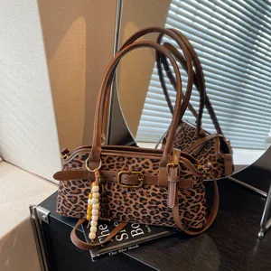 Chic vintage leopard print shoulder bag for women, stylish underarm handbag for autumn.