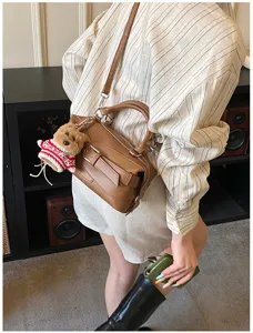 Stylish women brown boston shoulder bag bowling handbag chic PU leather crossbody bag for daily.
