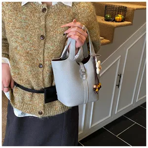 Elegante Damen Eimer Tasche aus echtem Leder, stilvolle minimalistische Handtasche Griff.