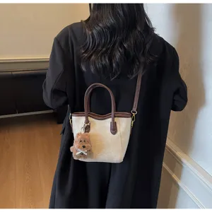 Retro color-block bucket bag for women 2025 autumn fashion PU leather handbag with shoulder strap.