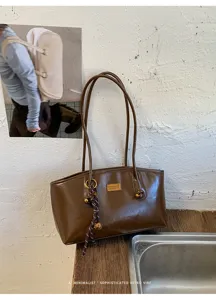 Bolso de hombro retro marrón para mujer, bolso tote vintage con etiqueta de metal.