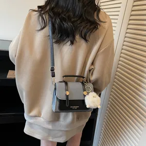 Retro women crossbody small square bag, stylish contrast shoulder bag with fluffy pom.