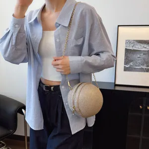 Stylish round ball crossbody bag for women, sparkling chain shoulder bag with unique design.