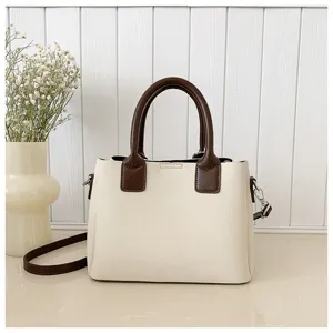 Retro chic women crossbody bucket bag, stylish small shoulder bag for spring and summer.