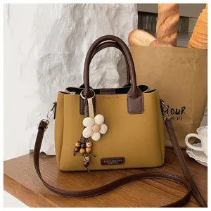 Vintage mustard yellow PU leather shoulder crossbody bag with cute flower pendant charm