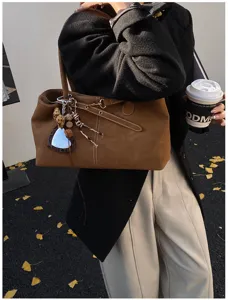Brown suede tote bag for women, stylish minimalist shoulder bag with chic design for daily commute.