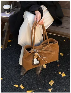 Brown suede tote bag for women, stylish niche design shoulder bag for daily commuting.
