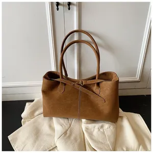 Brown suede tote bag for women, chic casual shoulder handbag with double handles for commute.