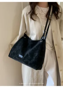 Women's black matte large capacity shoulder tote bag, stylish casual commuting handbag.