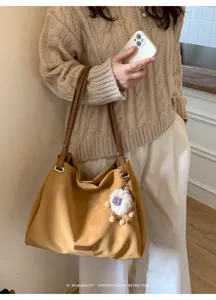 Solid color matte large capacity tote bag for women, stylish shoulder handbag for commute.