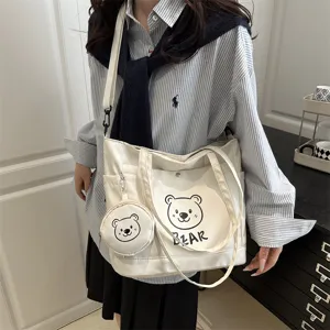 Large capacity canvas tote bag for women, cute bear print shoulder bag, casual commuting handbag.