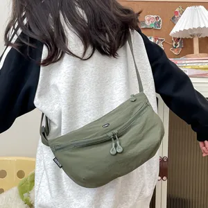Casual nylon crossbody sling bag for women, lightweight trendy daily chest bag in green.