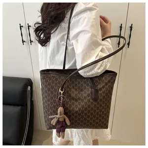 Large capacity casual commuting tote bag with cute rabbit pendant, stylish monogram shoulder bag.