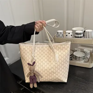 Large capacity casual commuter tote bag with stylish M print and cute rabbit pendant.