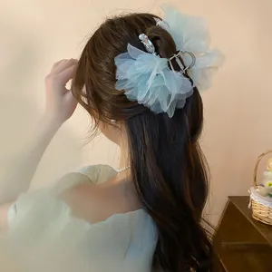 Blue sheer flower hair claw clip with pearl detail, elegant mesh shark hairpin accessory.
