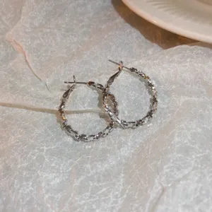 Silver hoop earrings with sparkling faceted design, chic minimalist jewelry for women daily wear.