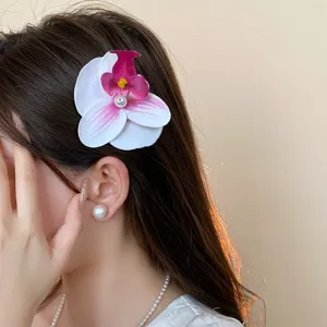 Elegant pearl orchid hair claw clip, sweet flower shark clip for chic back head styling.