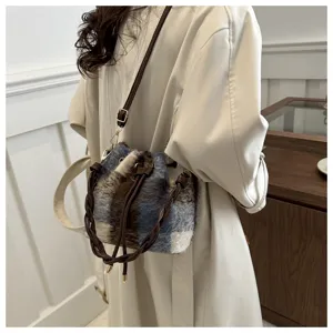 Winter stylish colorblock plaid bucket bag with braided strap and casual shoulder design.