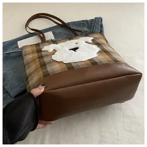 Large capacity wool plaid tote bag featuring a cute white dog applique and brown leather base.