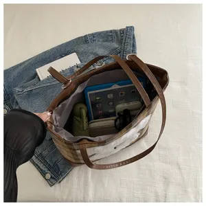 Large capacity woolen plaid tote bag for women, stylish shoulder handbag with plush patch detail.